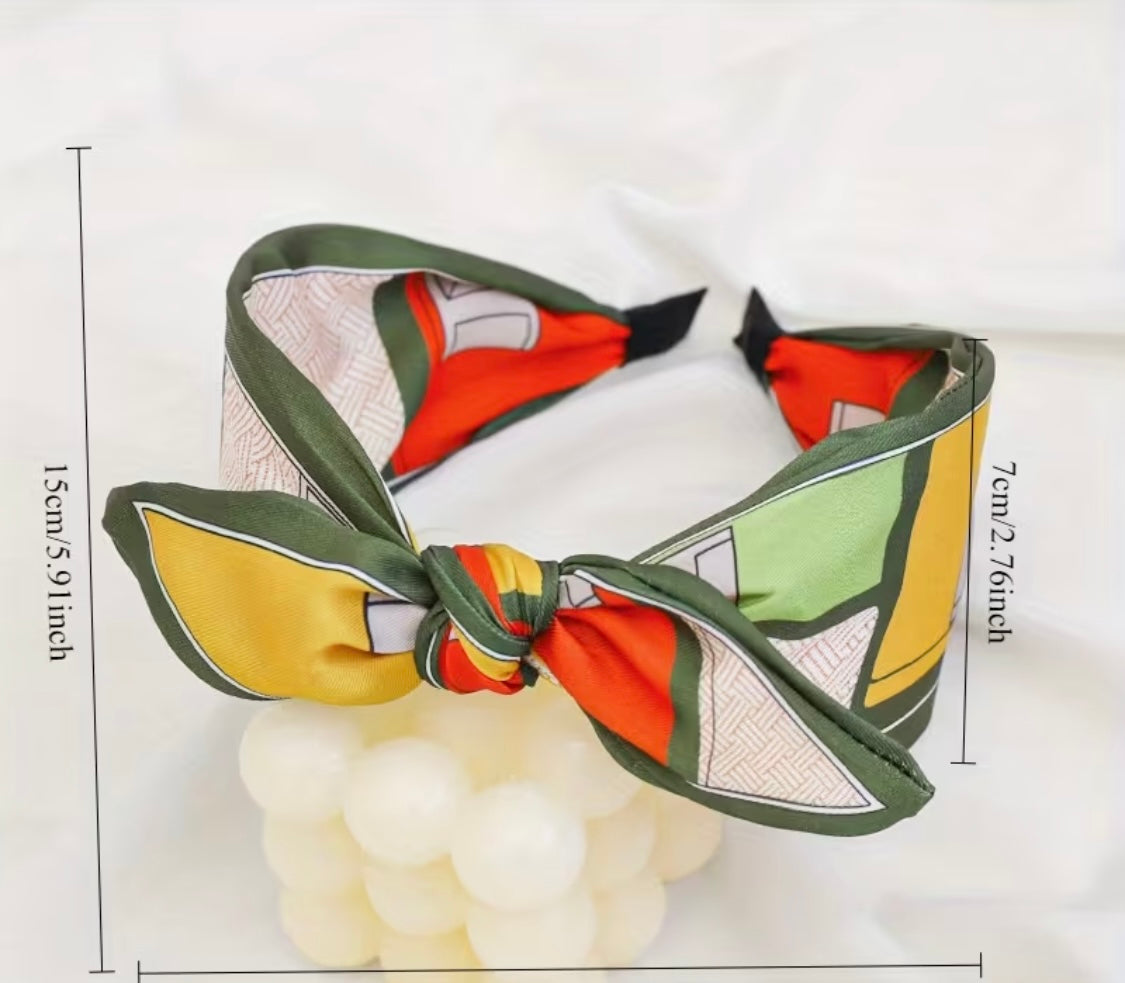 Haarreif mit Knoten – Buntes Retro-Muster in Grün, Gelb & Orange