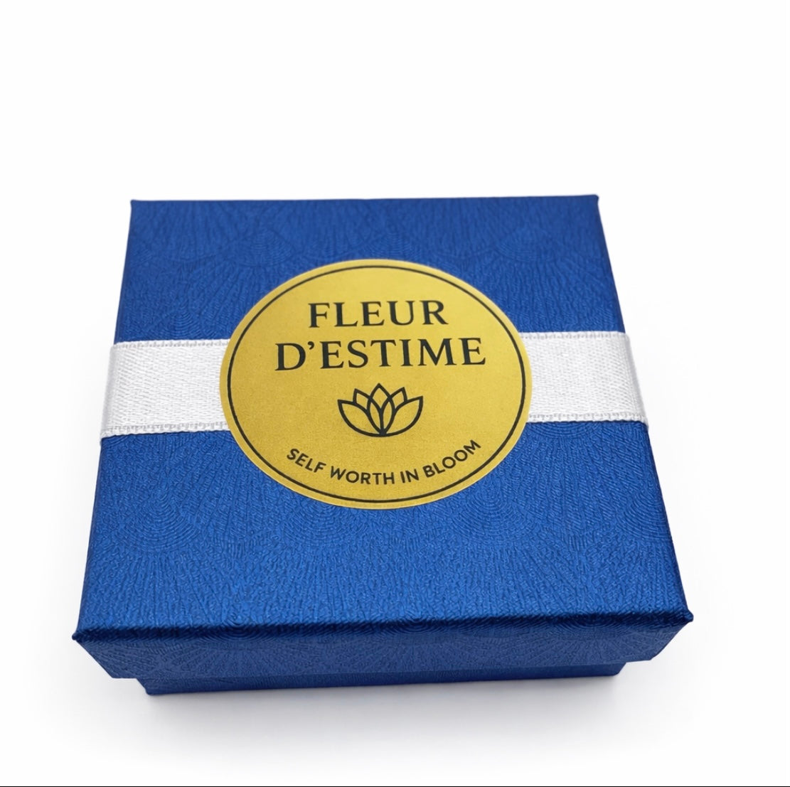 Goldene Notenschlüssel-Brosche mit Perle – Fleur d'Estime